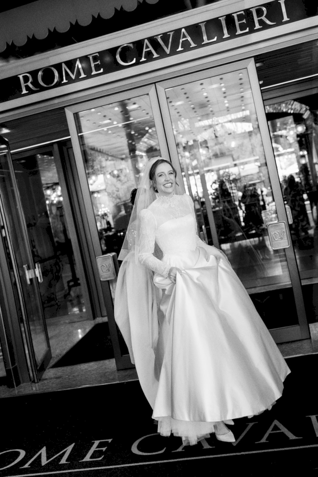 Phillipa_Lepley_Bride_Taylor_Bespoke_Vatican_Wedding_Dress_Duchess_Satin_Strapless_Gown_And_Lace_Long_Sleeve_Top_With_Embroidered_Script_Veil