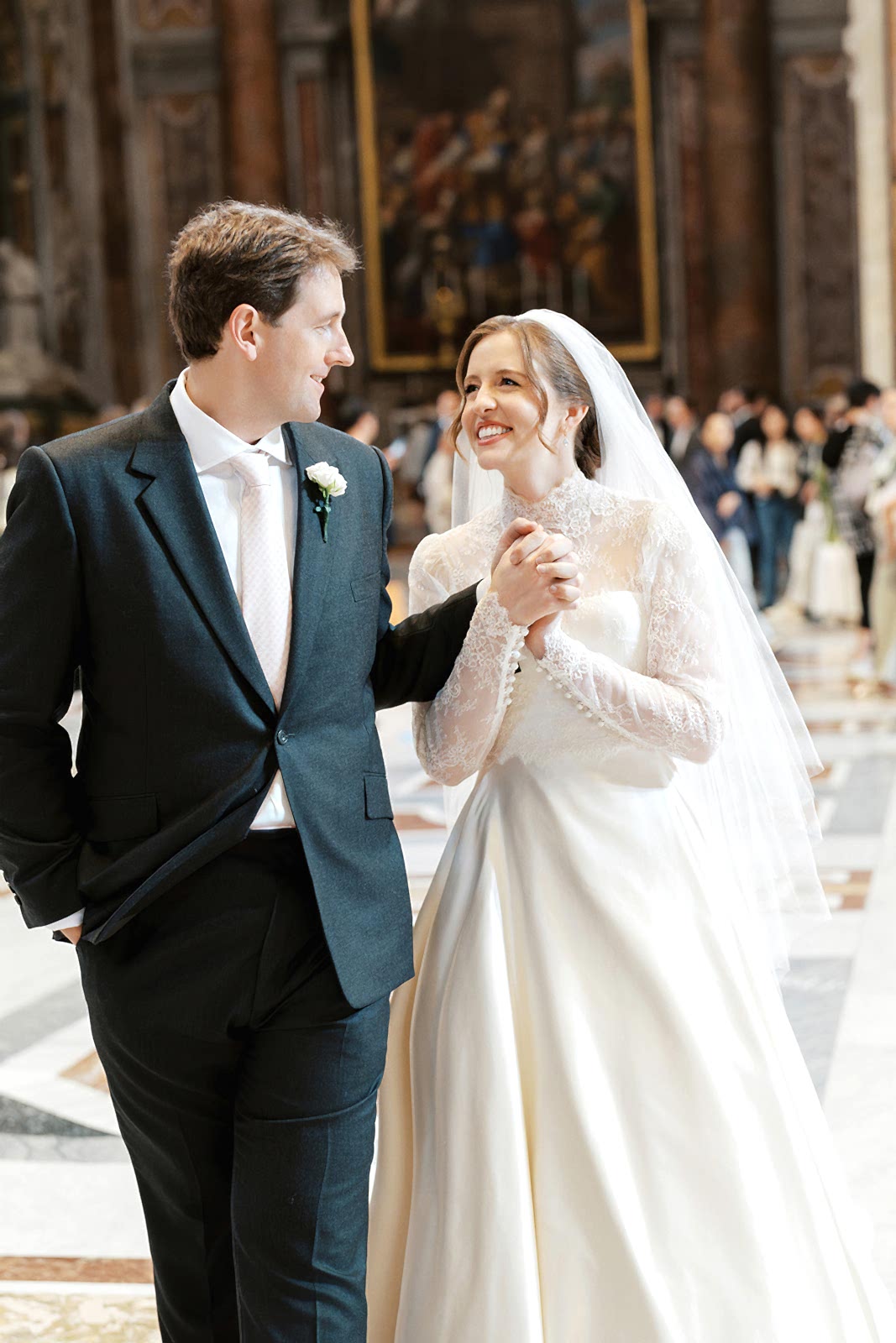 Phillipa_Lepley_Bride_Taylor_Bespoke_Vatican_Wedding_Dress_Duchess_Satin_Strapless_Gown_And_Lace_Long_Sleeve_Top_With_Embroidered_Script_Veil