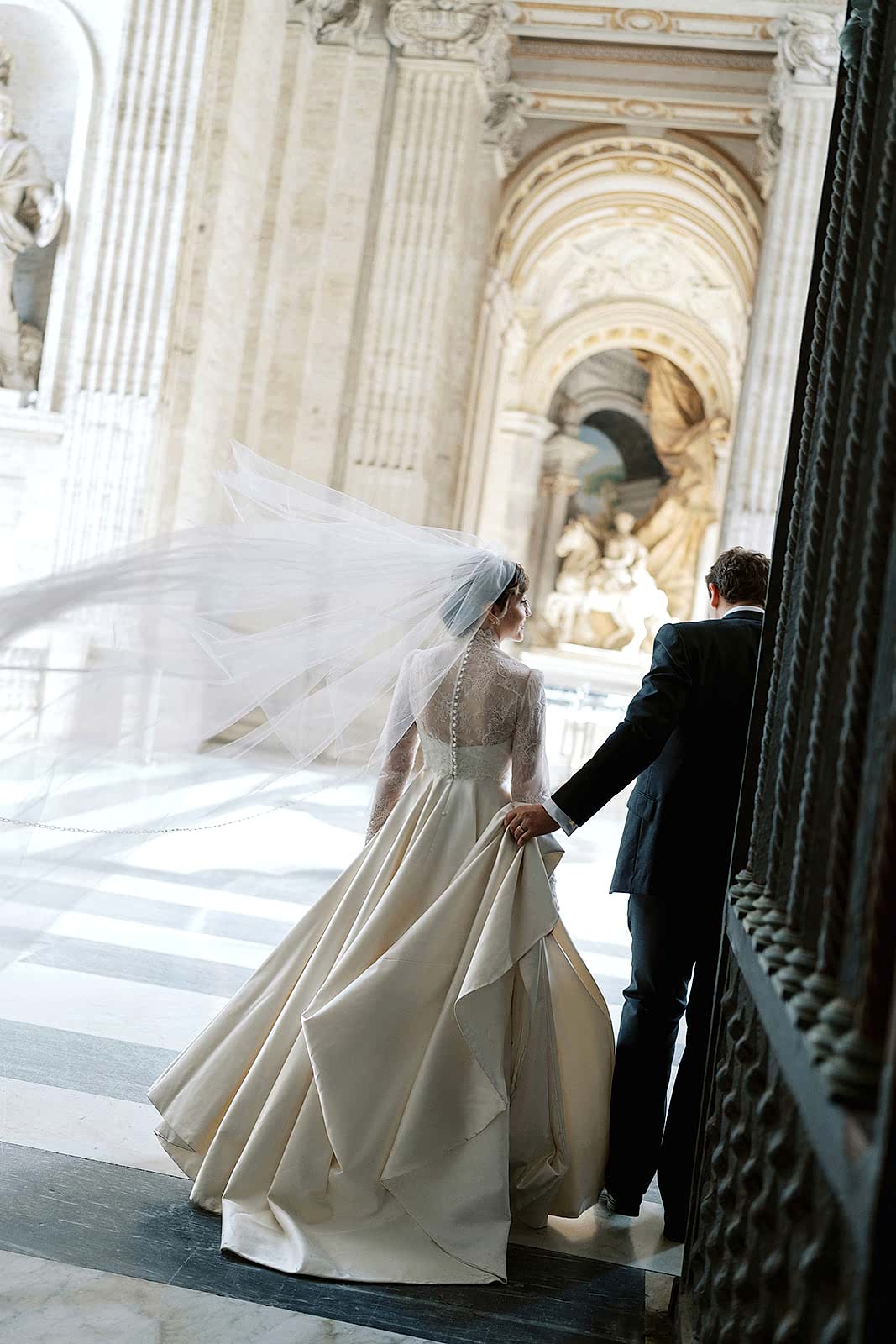 Phillipa_Lepley_Bride_Taylor_Bespoke_Vatican_Wedding_Dress_Duchess_Satin_Strapless_Gown_And_Lace_Long_Sleeve_Top_With_Embroidered_Script_Veil