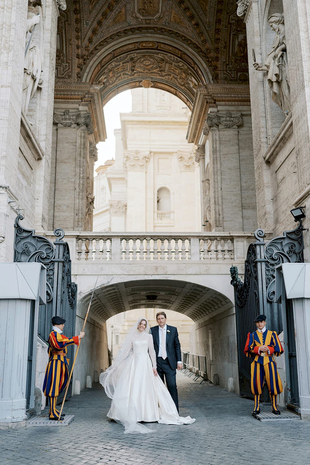 Phillipa_Lepley_Bride_Taylor_Bespoke_Vatican_Wedding_Dress_Duchess_Satin_Strapless_Gown_And_Lace_Long_Sleeve_Top_With_Embroidered_Script_Veil