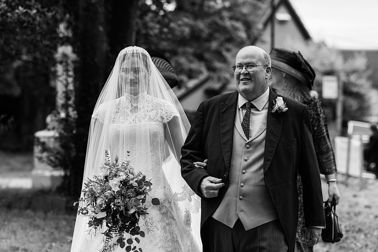 Phillipa_Lepley_bride_Amelia_Corseted_Couture_Scroll_Lace_Wedding_Dress_With_High_Neck_Lace_Border_Veil