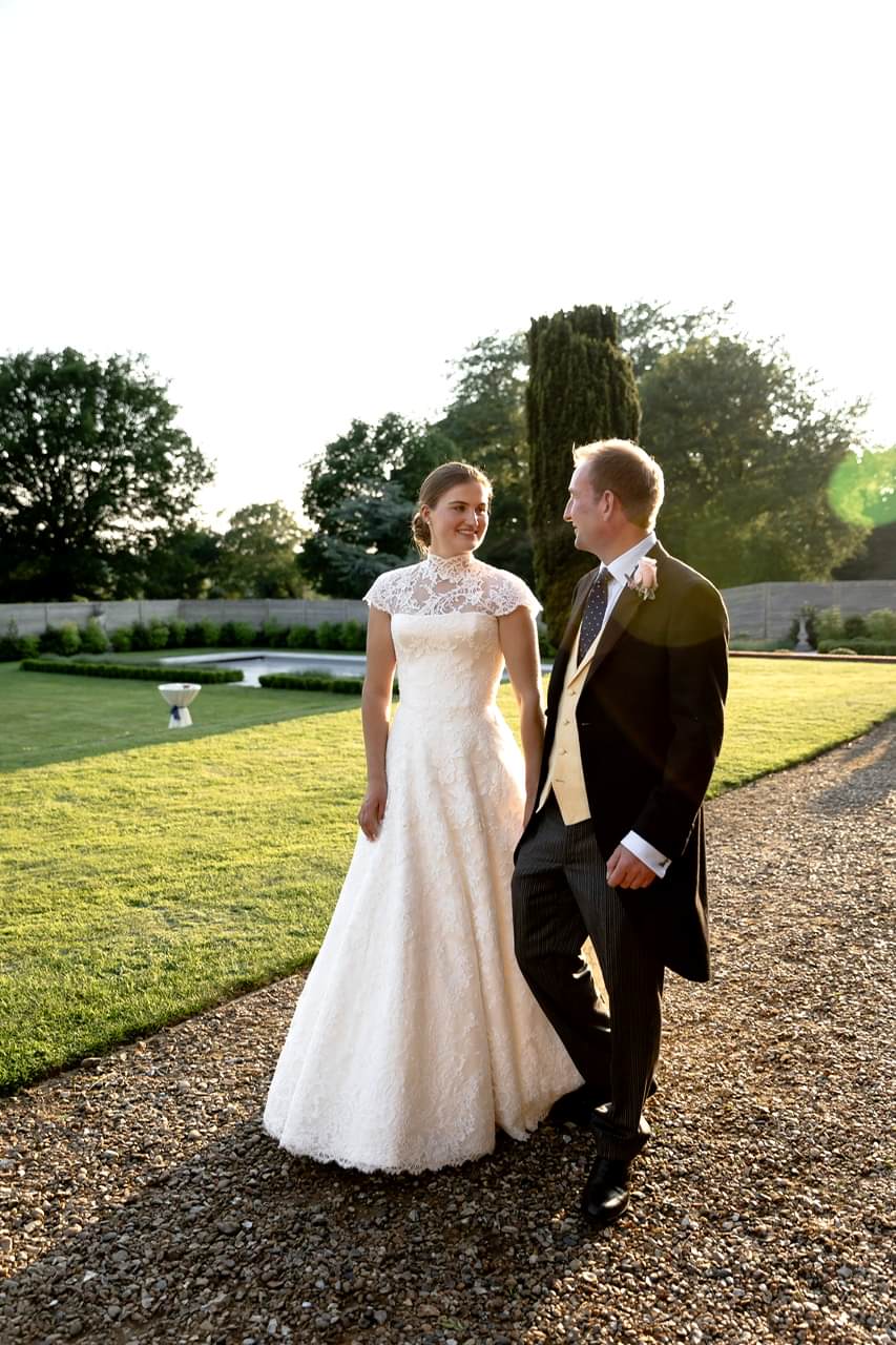 Phillipa_Lepley_bride_Amelia_Corseted_Couture_Scroll_Lace_Wedding_Dress_With_High_Neck_Lace_Border_Veil