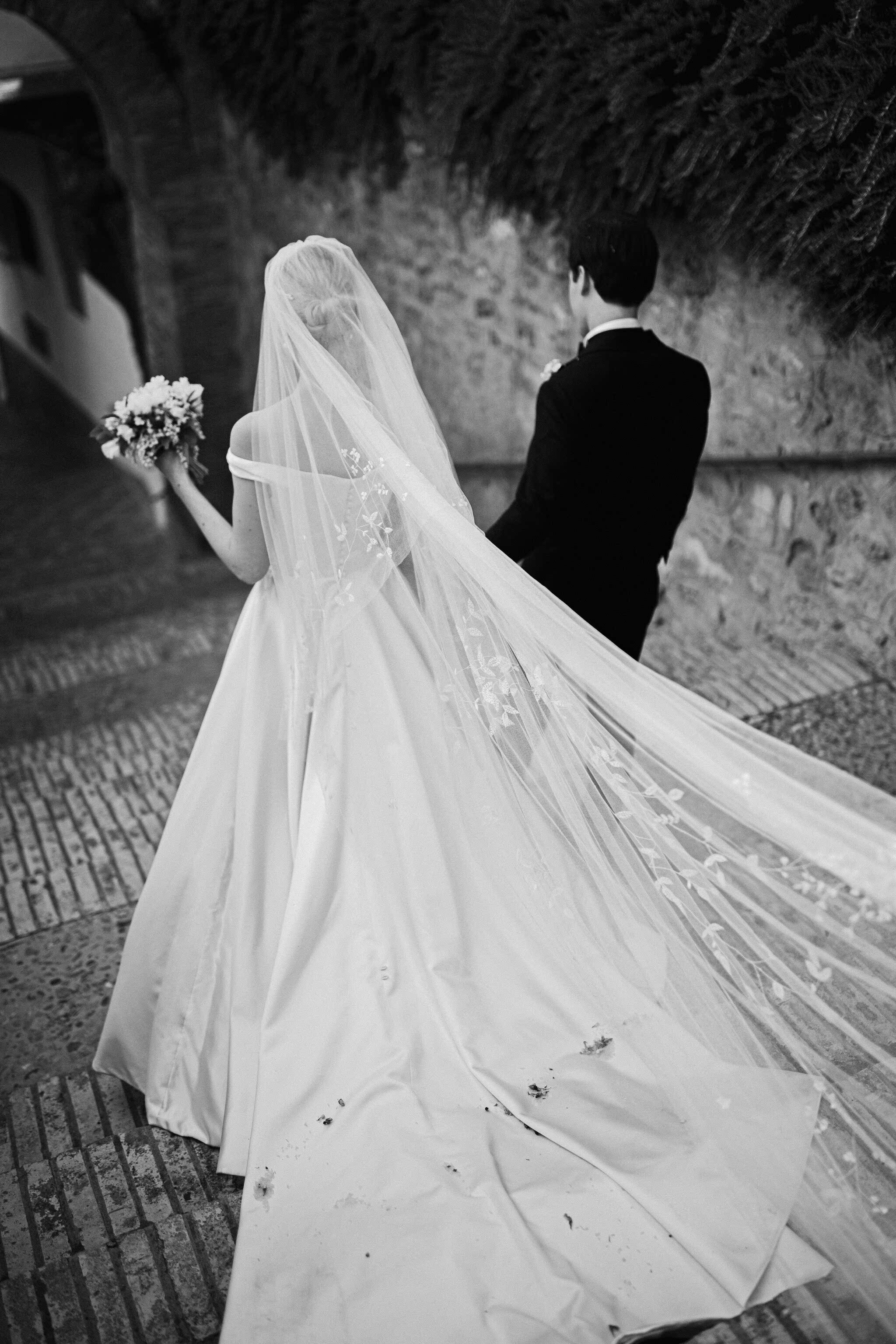Phillipa_Lepley_bride_Alexandra_Timeless_Duchess_Satin_Couture_Wedding_Dress_with_Bow_and_Hand_Embroidered_Veil_Spanish_Wedding
